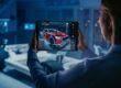Automotive,Engineer,Working,On,Electric,Car,Chassis,Platform,,Using,Tablet