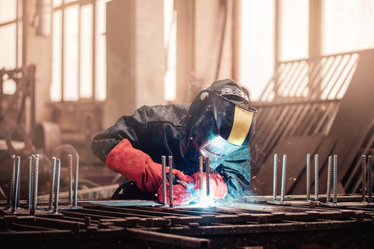 Welder,In,Protective,Uniform,With,Mask.,Factory,Industrial,Worker,On Welder's Job