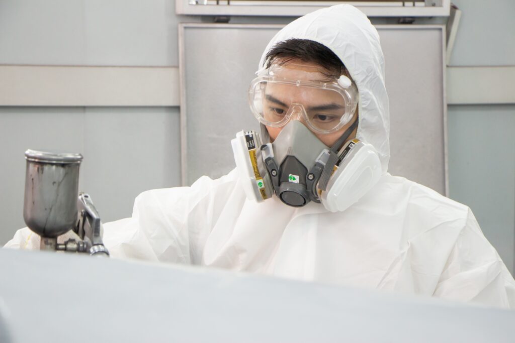 Entrepreneur,Businessman,Small,Business,Owner,,Paint,Garage,,Car,Repair,Shop. Man using PPE