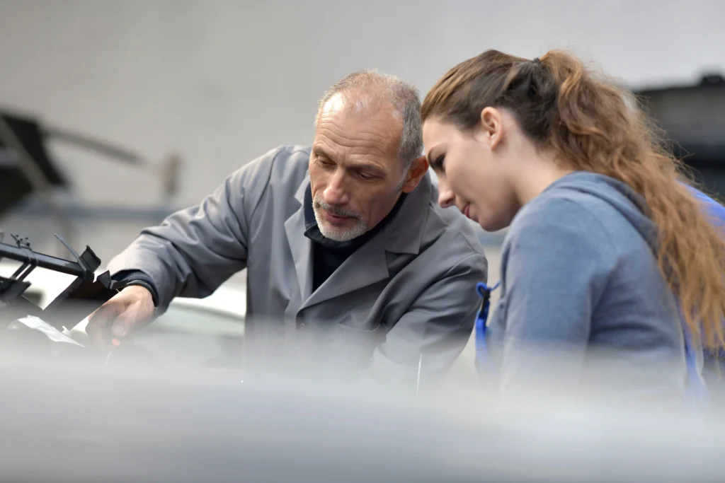 Spray Painting Certification: trainer with trainee