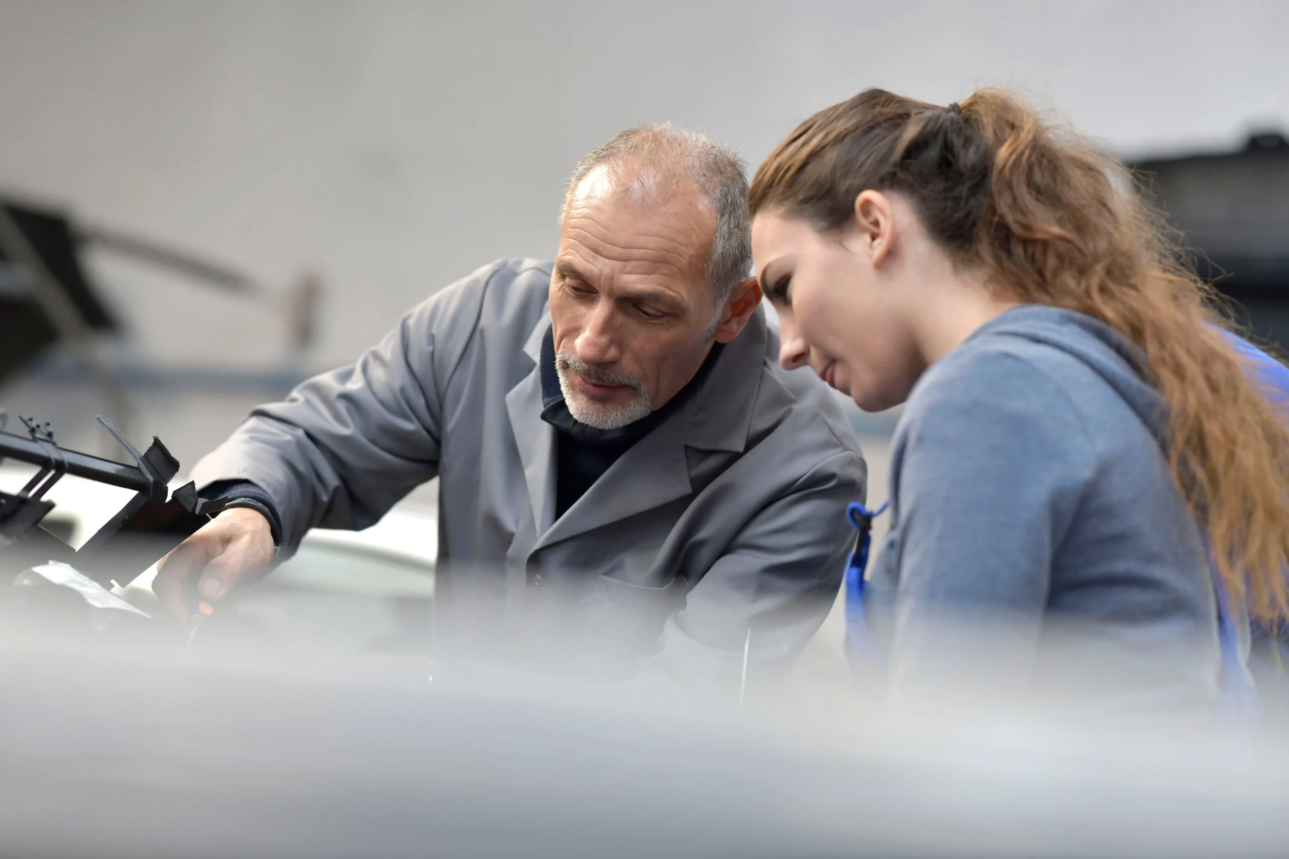 Spray Painting Certification: trainer with trainee